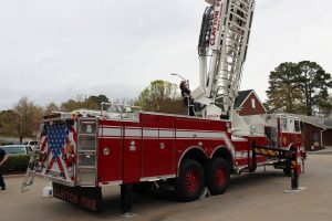 Ladder 2 C-Shift Captain Kyle Driver on the Clayton Fire Department Ladder Truck